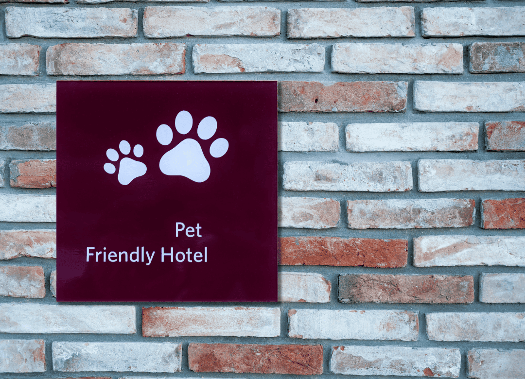 a sign at a dog-friendly hotel says the facility is pet friendly