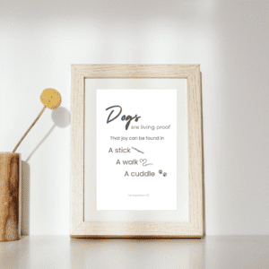 inspirational dog wall art printable quote with how dogs appreciate the simple things is matted, framed, and on display